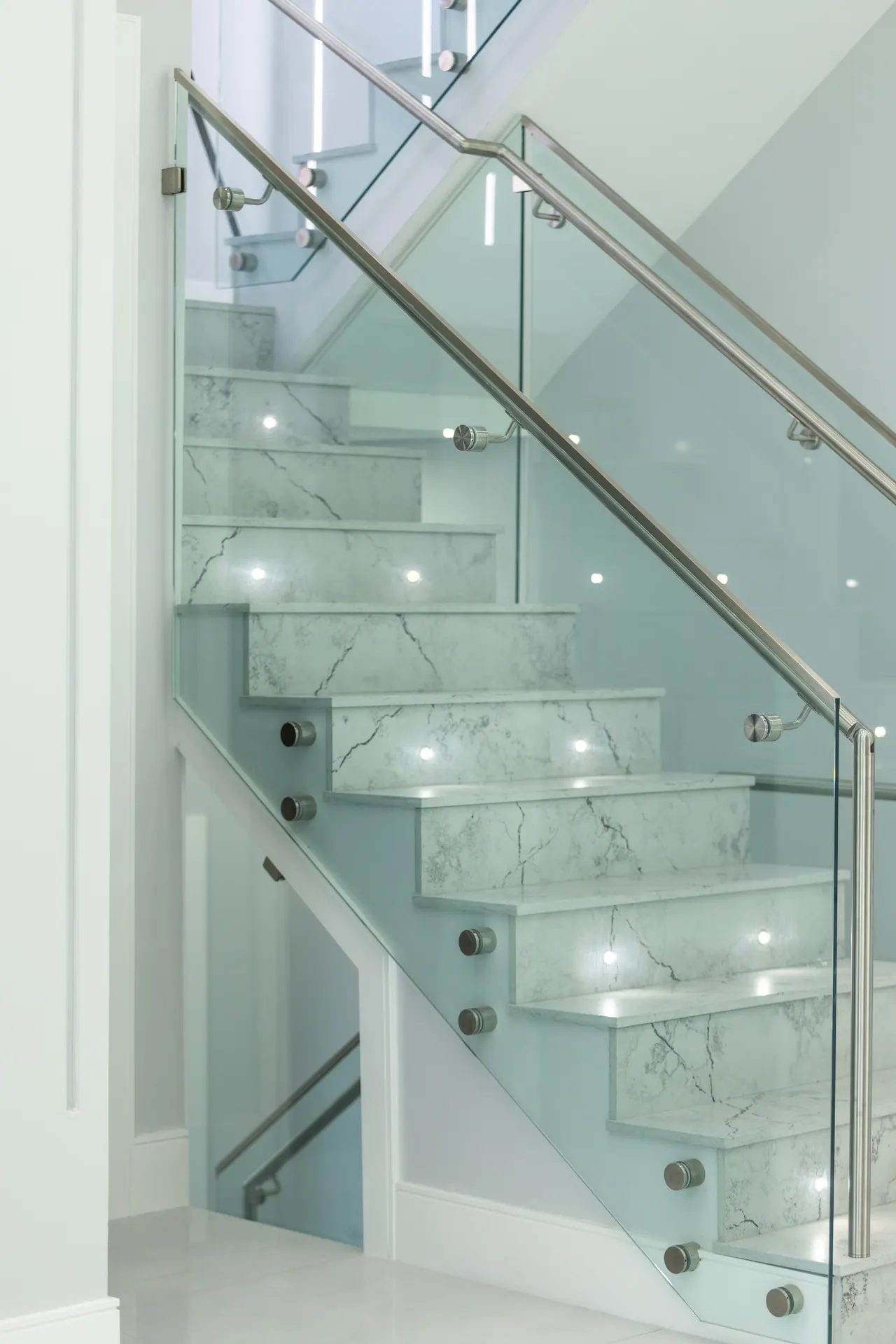 Glass staircase at Mayfair Ave